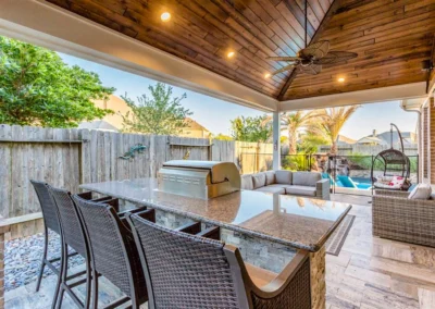 outdoor kitchen and living area